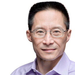 Eric Liu's headshot, Eric is wearing a purple button down collared shirt and wearing glasses. He also has dark hair. 