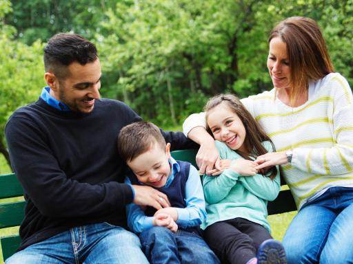 Image of a family on a bench