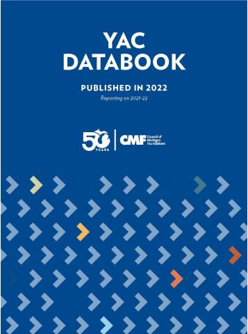 Cover of the YAC Databook with Blue background and the 50th CMF anniversary logo