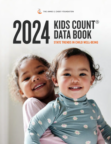 The cover of the 2024 Kids Count Data Book featuring two small children smiling