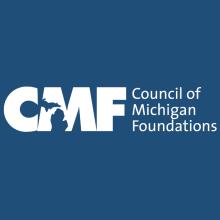 Council of Michigan Foundations Logo in White on a Dark Blue Background