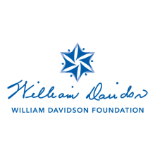 William Davidson Foundation Logo with William Davidson signature font and a six point star like logo stacked over the name