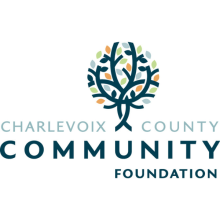 Charlevoix County Community Foundation logo with a tree growing between the words Charlevoix and County and Community Foundation below that text and tree