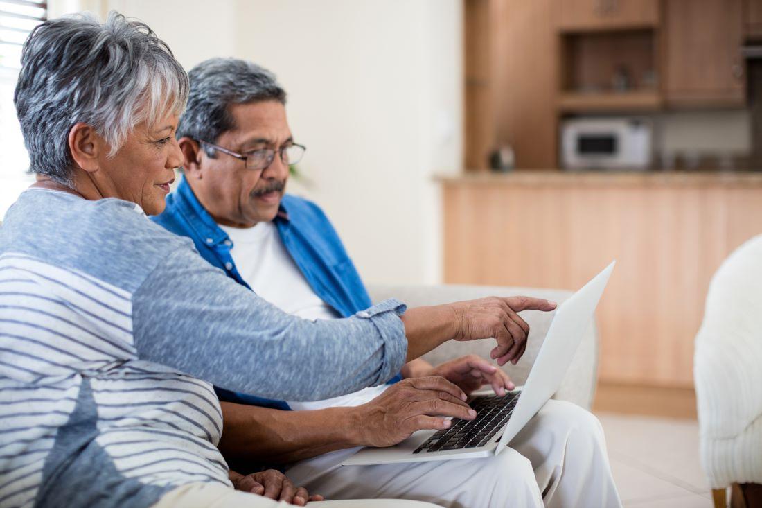 Family on a laptop computer. 